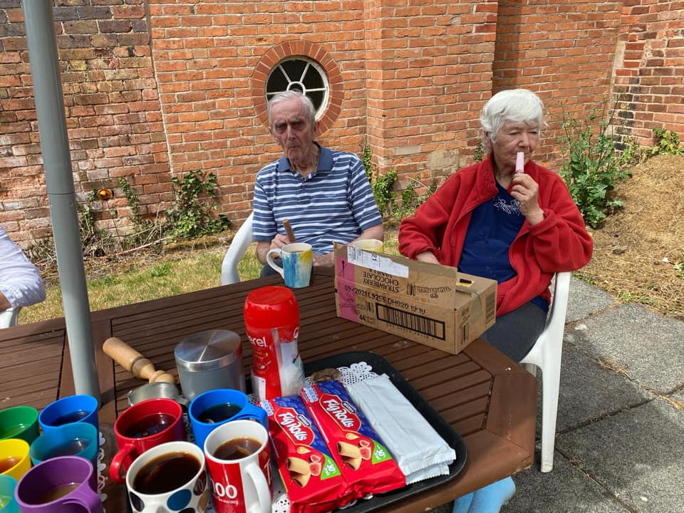 Residents Enjoying Ice Creams, Biscuits and Tea in the New Garden Area